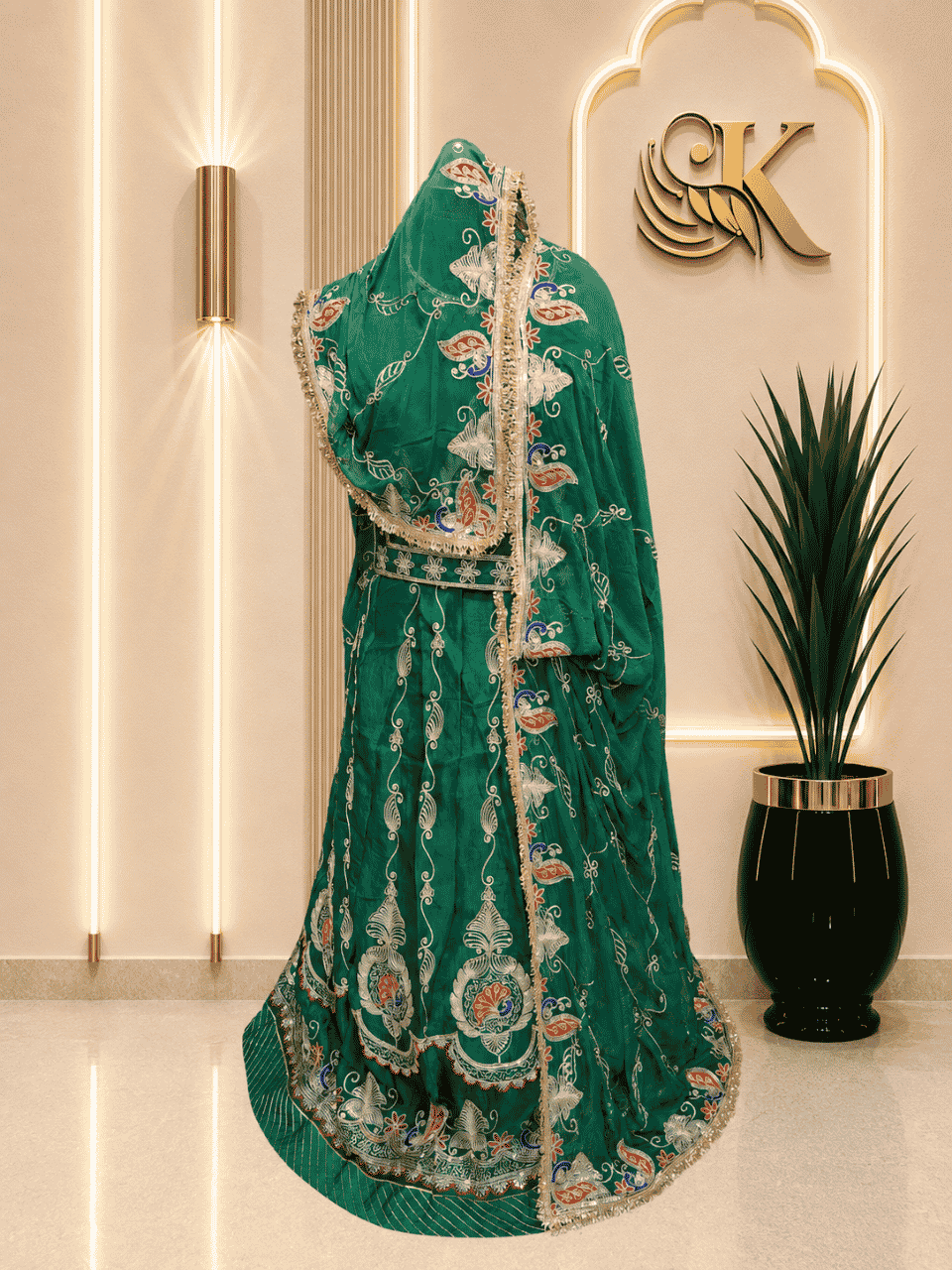 untitled-design-2-220 Navya Fendy Silk Rajputi Poshak
- Green - Image 1